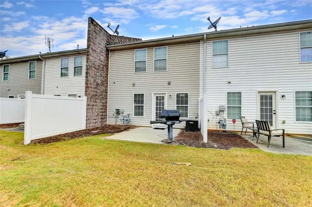 a view of swimming pool with outdoor seating
