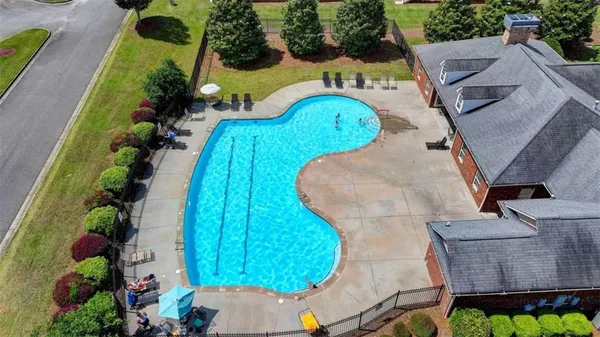 an aerial view of a swimming pool