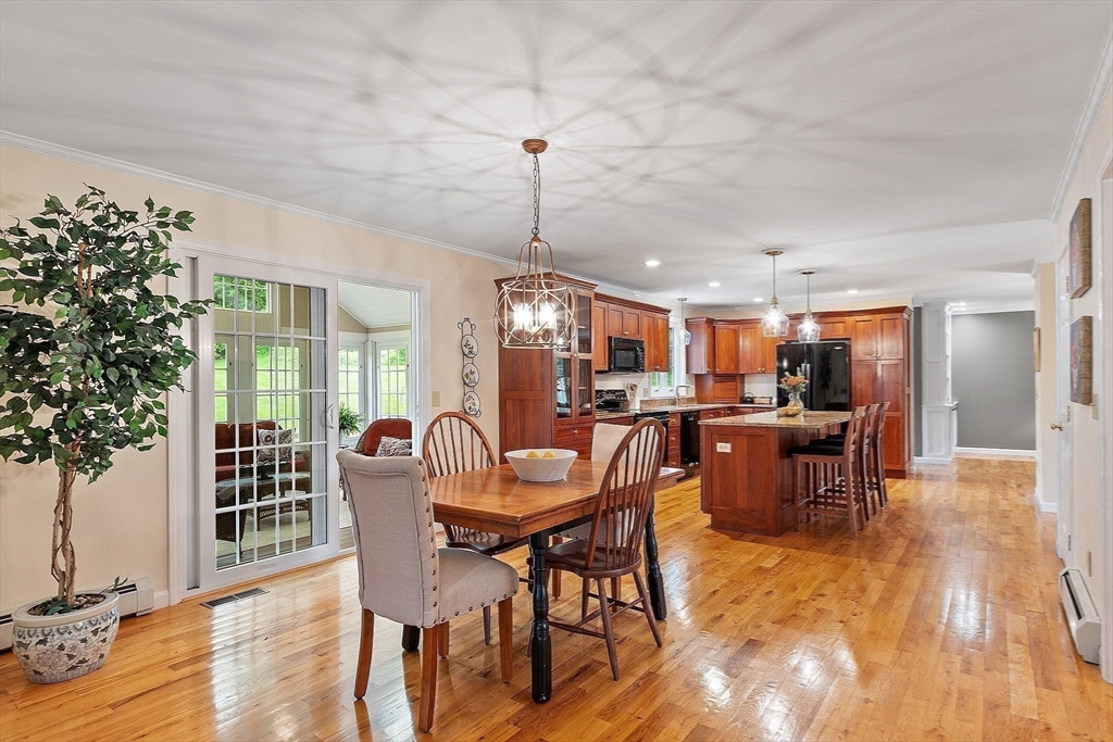 86 South Cross Road Haverhill, MA 01835 - Photo 13 of 42 a view of a dining room with furniture window and wooden floor