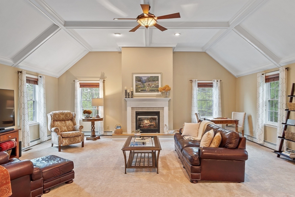 86 South Cross Road Haverhill, MA 01835 - Photo 16 of 42 a living room with furniture and a fireplace