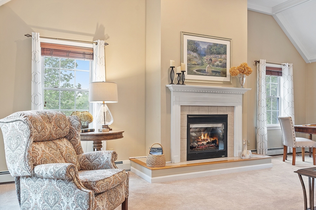 86 South Cross Road Haverhill, MA 01835 - Photo 17 of 42 a living room with furniture and a fireplace