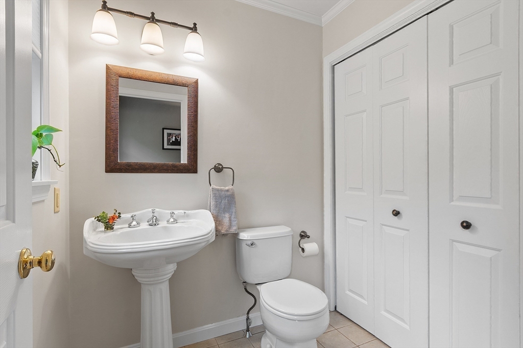 86 South Cross Road Haverhill, MA 01835 - Photo 22 of 42 a bathroom with a sink toilet and mirror