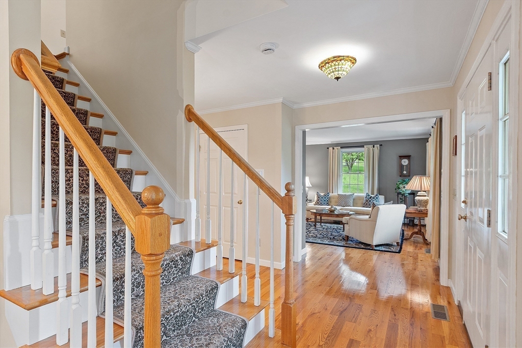 86 South Cross Road Haverhill, MA 01835 - Photo 23 of 42 a living room with furniture and stairs