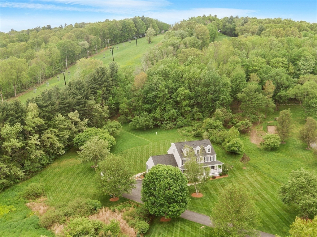 86 South Cross Road Haverhill, MA 01835 - Photo 36 of 42 a view of a lush green forest with a lake view