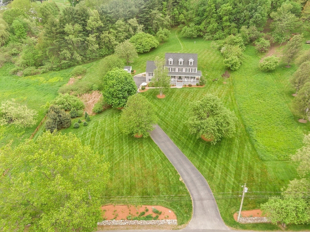 86 South Cross Road Haverhill, MA 01835 - Photo 5 of 42 a view of a street view with a garden