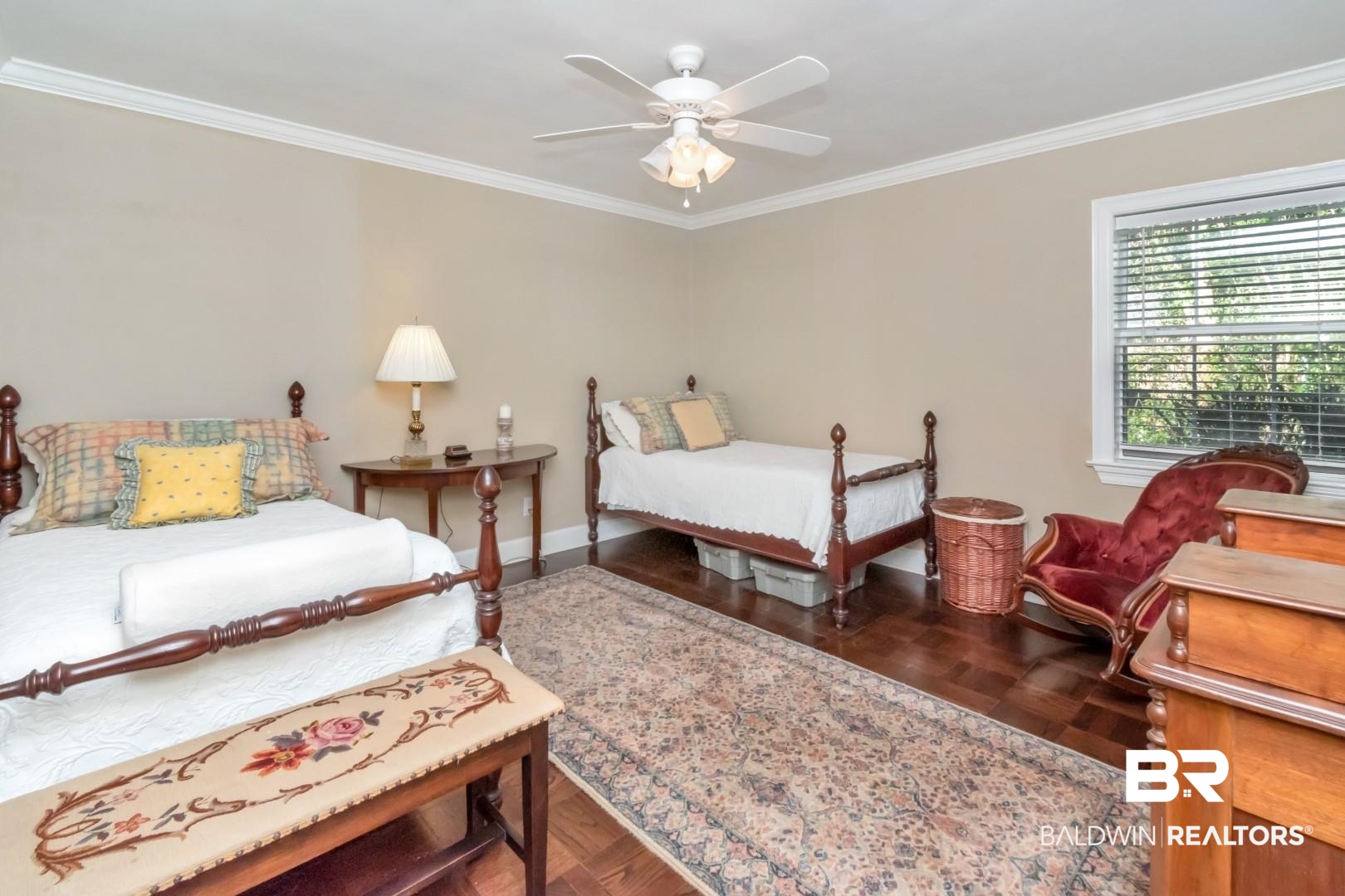 302 Springwood Drive East Mobile, AL 36608 - Photo 25 of 35 Bedroom featuring ceiling fan, crown molding, and dark wood-type flooring