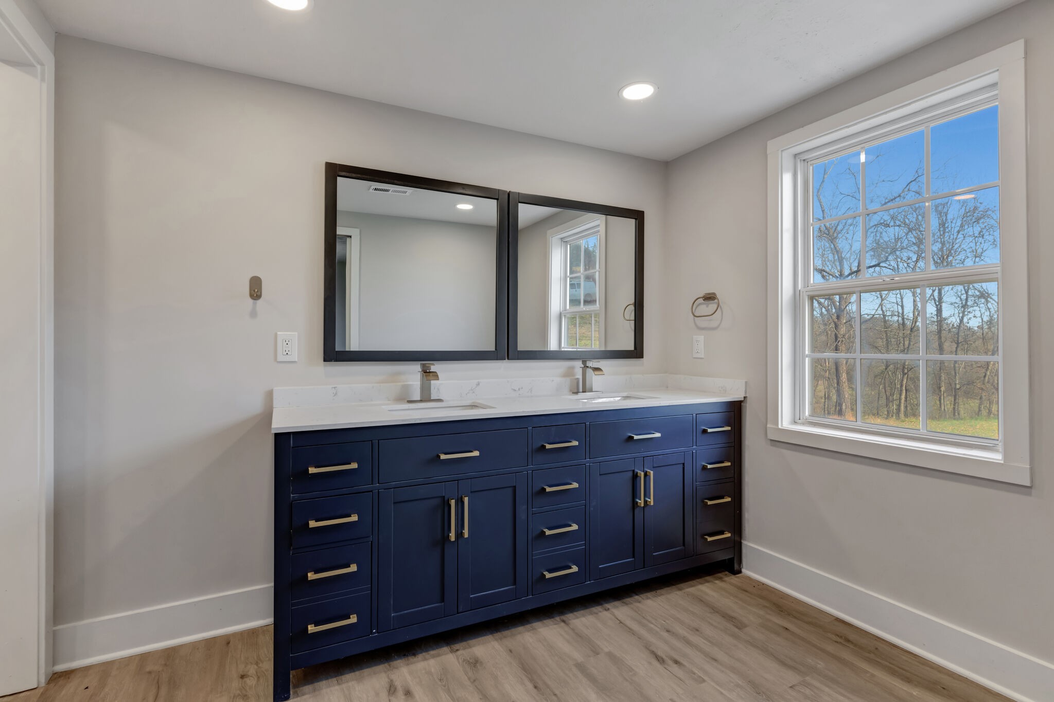 1225 Berea Church Road Lebanon, TN 37087 - Photo 18 of 26 a bathroom with a double vanity sink and a mirror