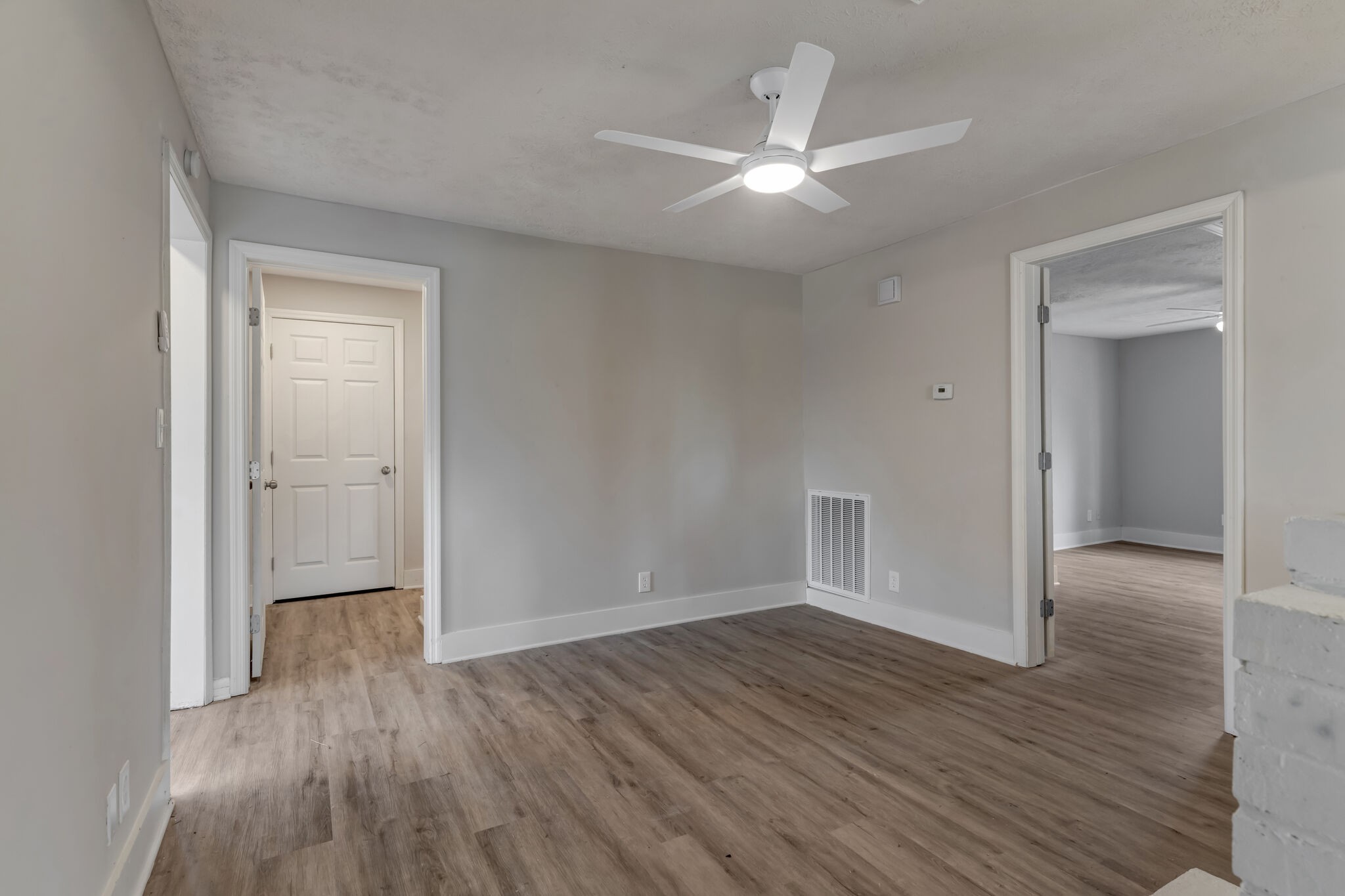 1225 Berea Church Road Lebanon, TN 37087 - Photo 4 of 26 wooden floor in an empty room with a window