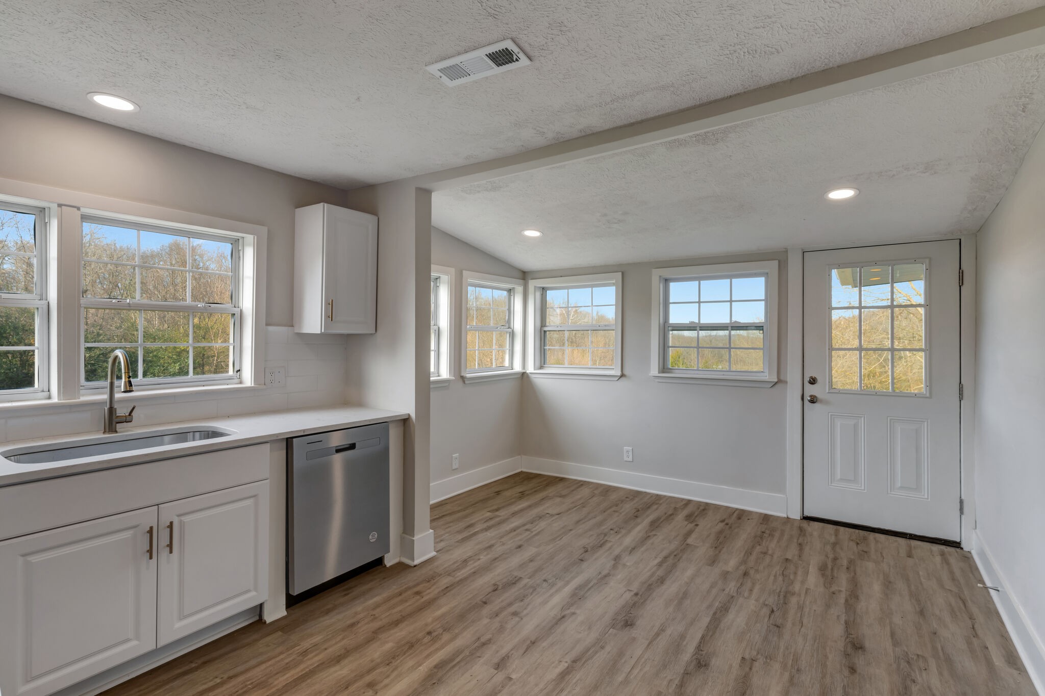 1225 Berea Church Road Lebanon, TN 37087 - Photo 8 of 26 a view of a kitchen sink and wooden floor