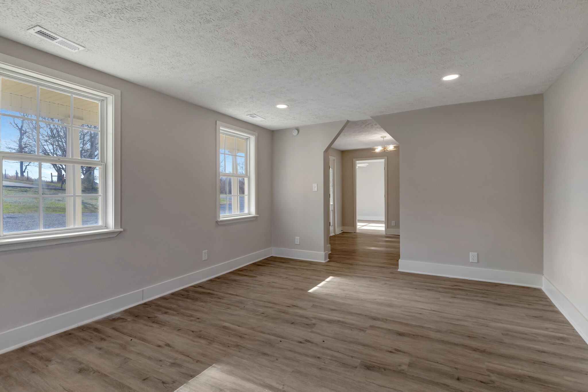 1225 Berea Church Road Lebanon, TN 37087 - Photo 10 of 26 a view of empty room with wooden floor and fan