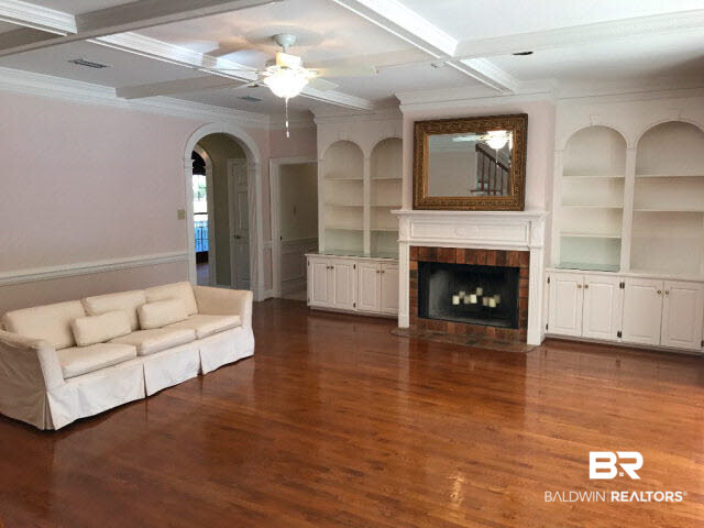 401 Potters Mills Road Daphne, AL 36526 - Photo 13 of 28 For Sale: 401 Potters Mill Avenue, Daphne, AL 36526 Living Room with built-ins and fireplace