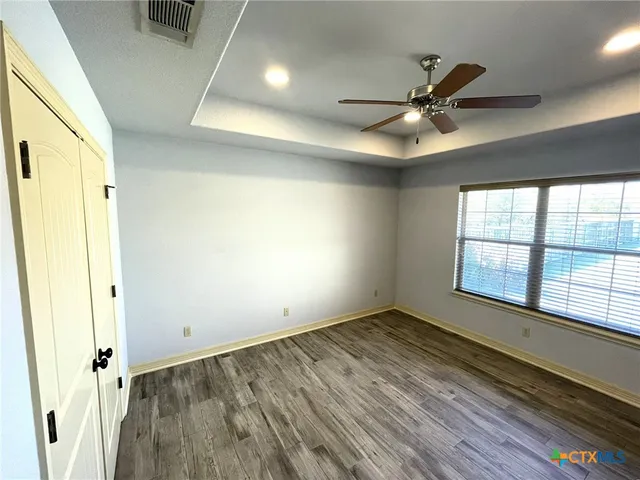 a view of an empty room and window