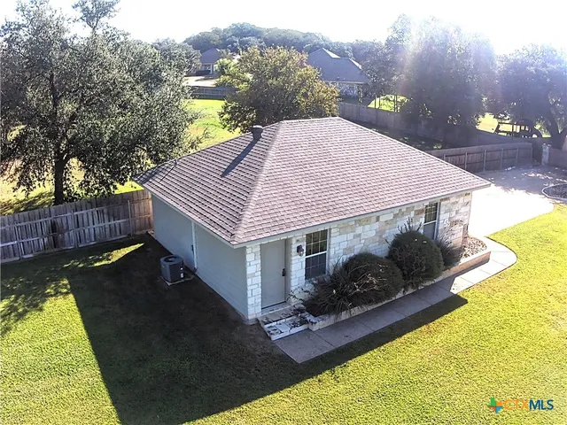 a house view with a swimming pool
