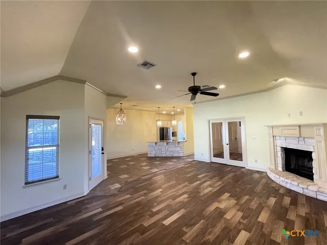 a view of a livingroom with a fireplace
