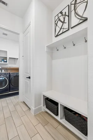 a utility room with cabinets