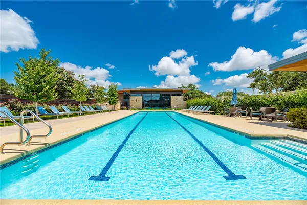 a view of a house with swimming pool