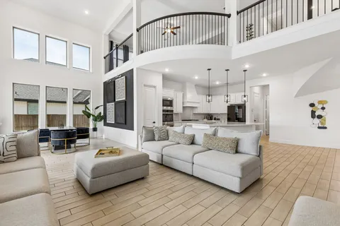 a living room with furniture and a table