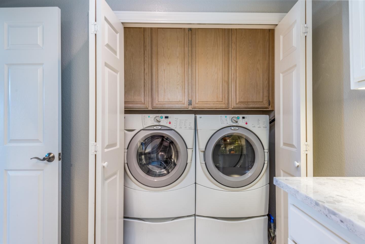 100 Farallon Drive Belmont, CA 94002 - Photo 19 of 29 a utility room with dryer and washer