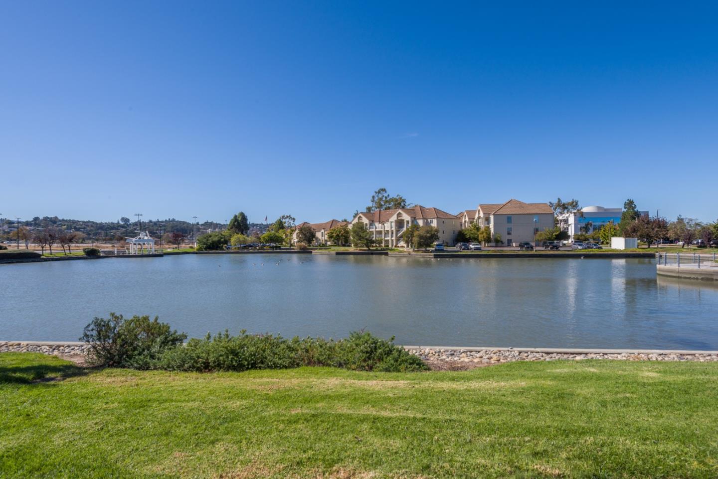 100 Farallon Drive Belmont, CA 94002 - Photo 27 of 29 a view of a lake with houses
