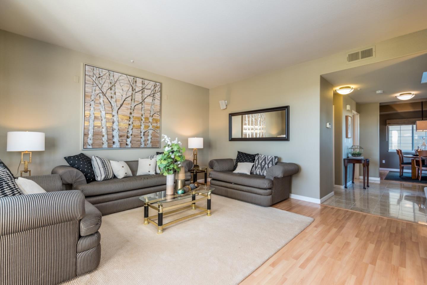 100 Farallon Drive Belmont, CA 94002 - Photo 6 of 29 a living room with furniture and a wooden floor