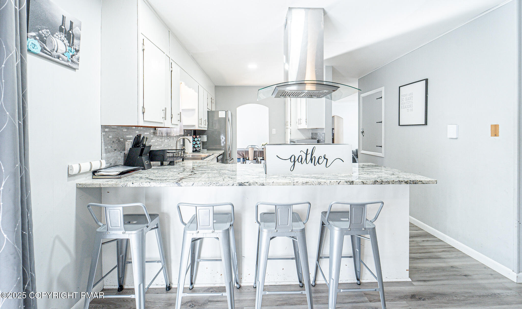 2332 Highway 940 Pocono Summit, PA 18346 - Photo 16 of 65 a kitchen with kitchen island granite countertop a table and chairs in it