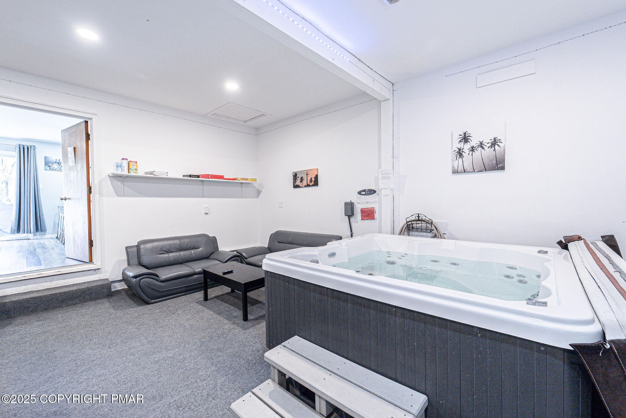 2332 Highway 940 Pocono Summit, PA 18346 - Photo 26 of 65 a bedroom with a bed and a chair