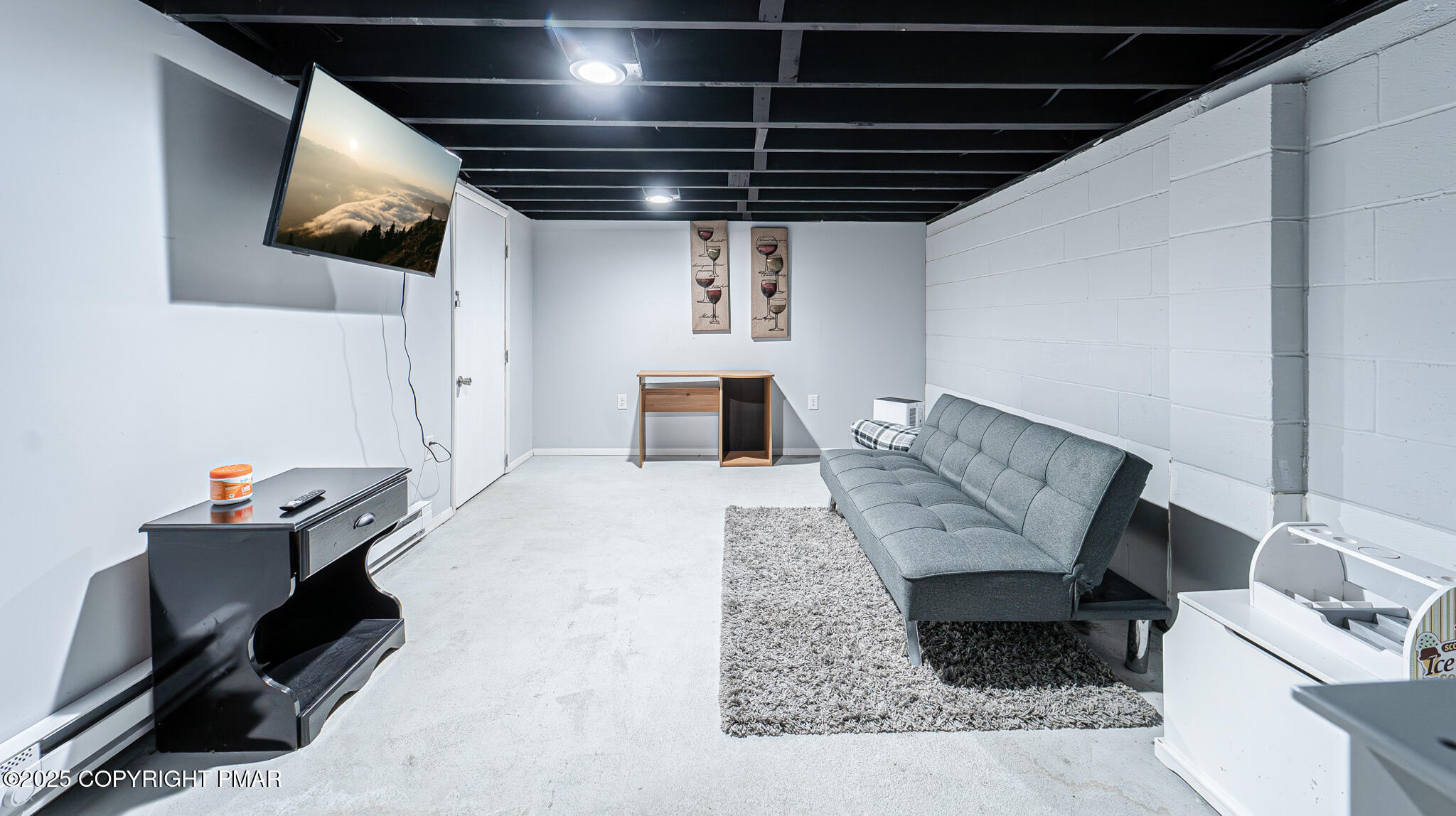 2332 Highway 940 Pocono Summit, PA 18346 - Photo 34 of 65 a living room with furniture and a flat screen tv