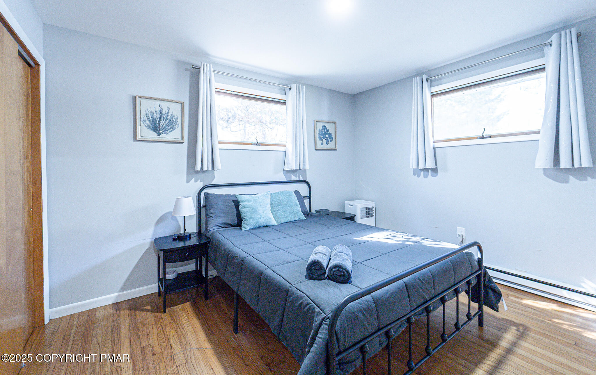 2332 Highway 940 Pocono Summit, PA 18346 - Photo 41 of 65 a bedroom with a bed and a window