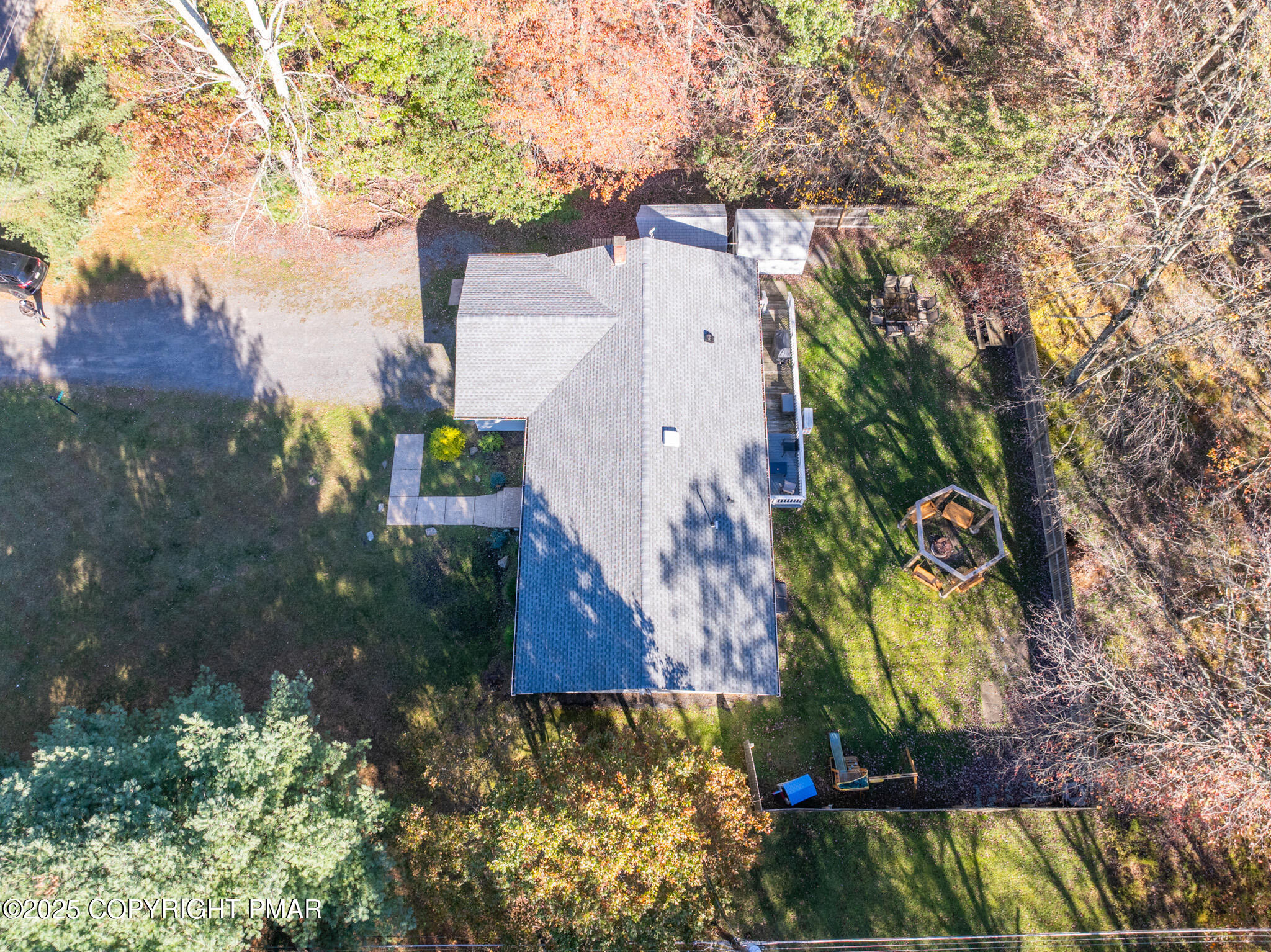 2332 Highway 940 Pocono Summit, PA 18346 - Photo 57 of 65 an aerial view of a house with a yard and large trees