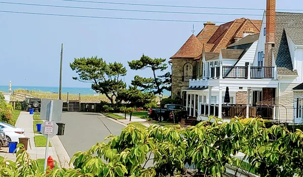 a kitchen with a sink stove and refrigerator