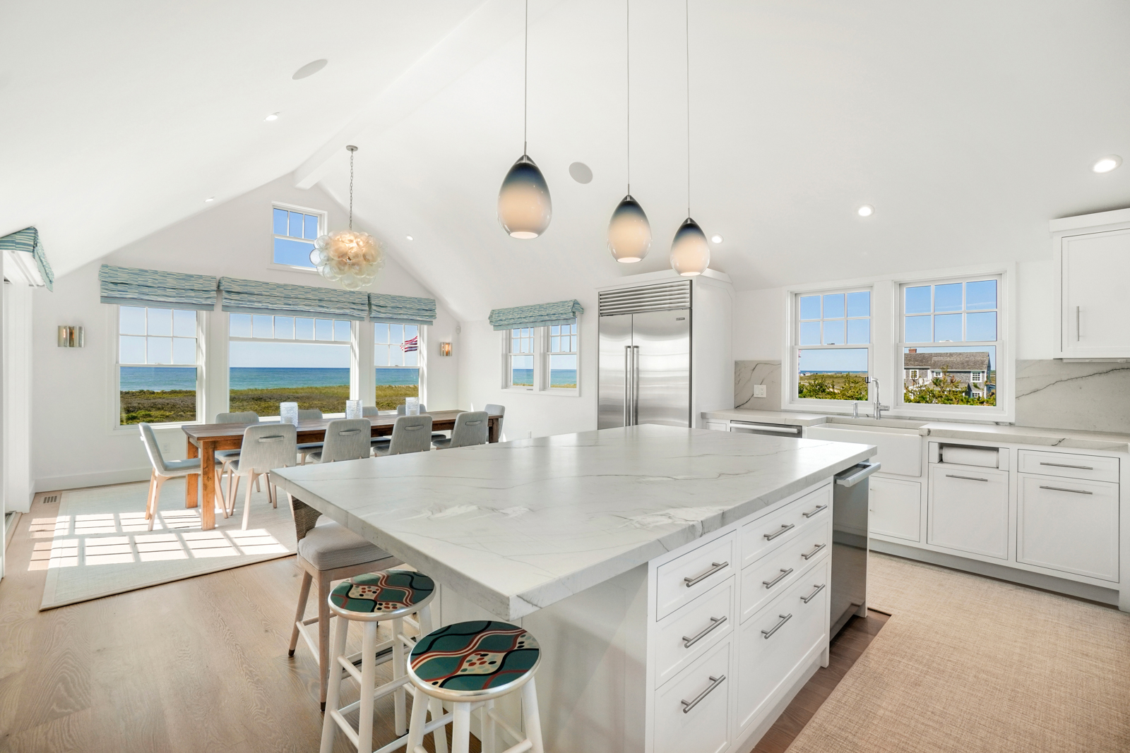 2 Marion Avenue Nantucket, MA 02554 - Photo 23 of 43 a large kitchen with kitchen island a large counter space a large window and stainless steel appliances