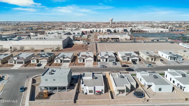 an aerial view of a city with ocean view