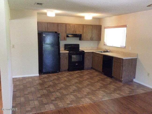 1230 Packer Road Southeast Palm Bay, FL 32909 - Photo 11 of 14 Kitchen view