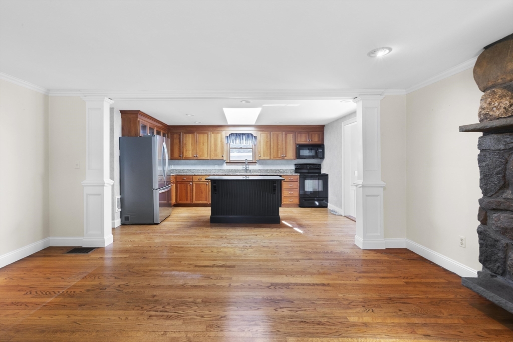152 Coburn Road Berlin, MA 01503 - Photo 14 of 40 a view of kitchen with a sink and a refrigerator