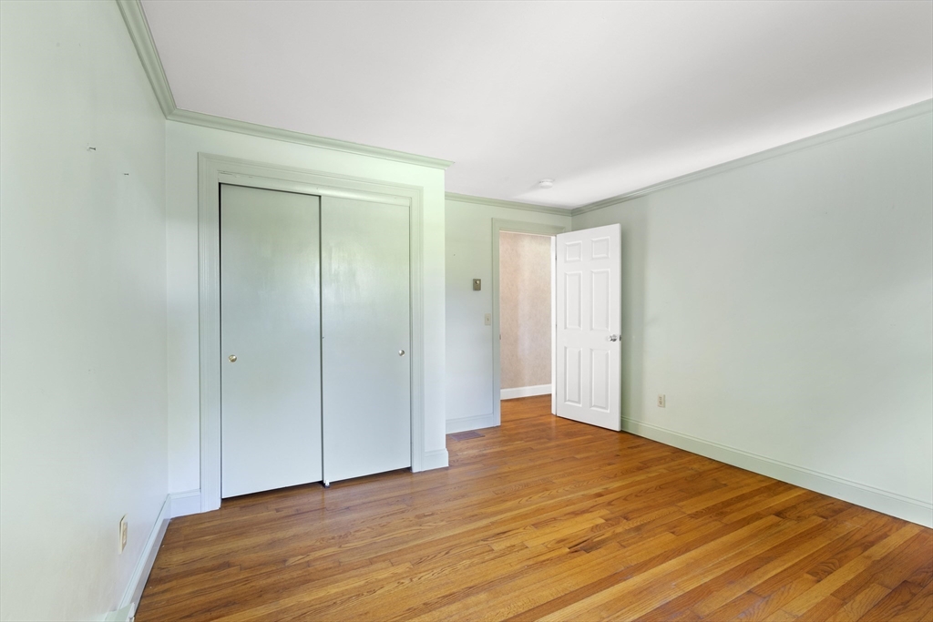 152 Coburn Road Berlin, MA 01503 - Photo 26 of 40 a view of a room with wooden floor and bathroom