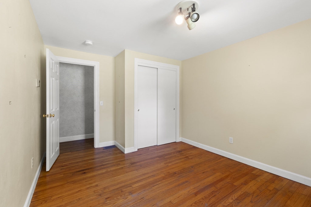 152 Coburn Road Berlin, MA 01503 - Photo 28 of 40 a view of empty room with wooden floor