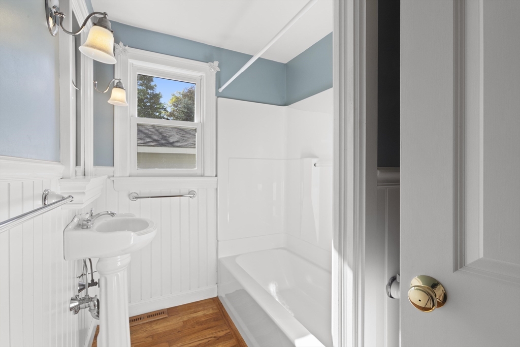 152 Coburn Road Berlin, MA 01503 - Photo 29 of 40 a bathroom with a tub and shower
