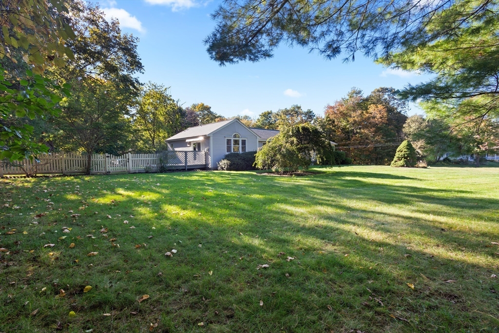152 Coburn Road Berlin, MA 01503 - Photo 3 of 40 a view of a big yard with a house in the background