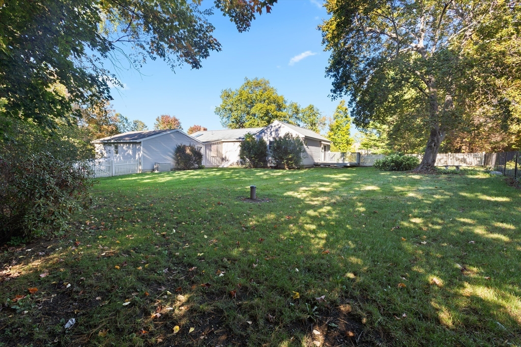 152 Coburn Road Berlin, MA 01503 - Photo 7 of 40 a backyard of a house with lots of green space
