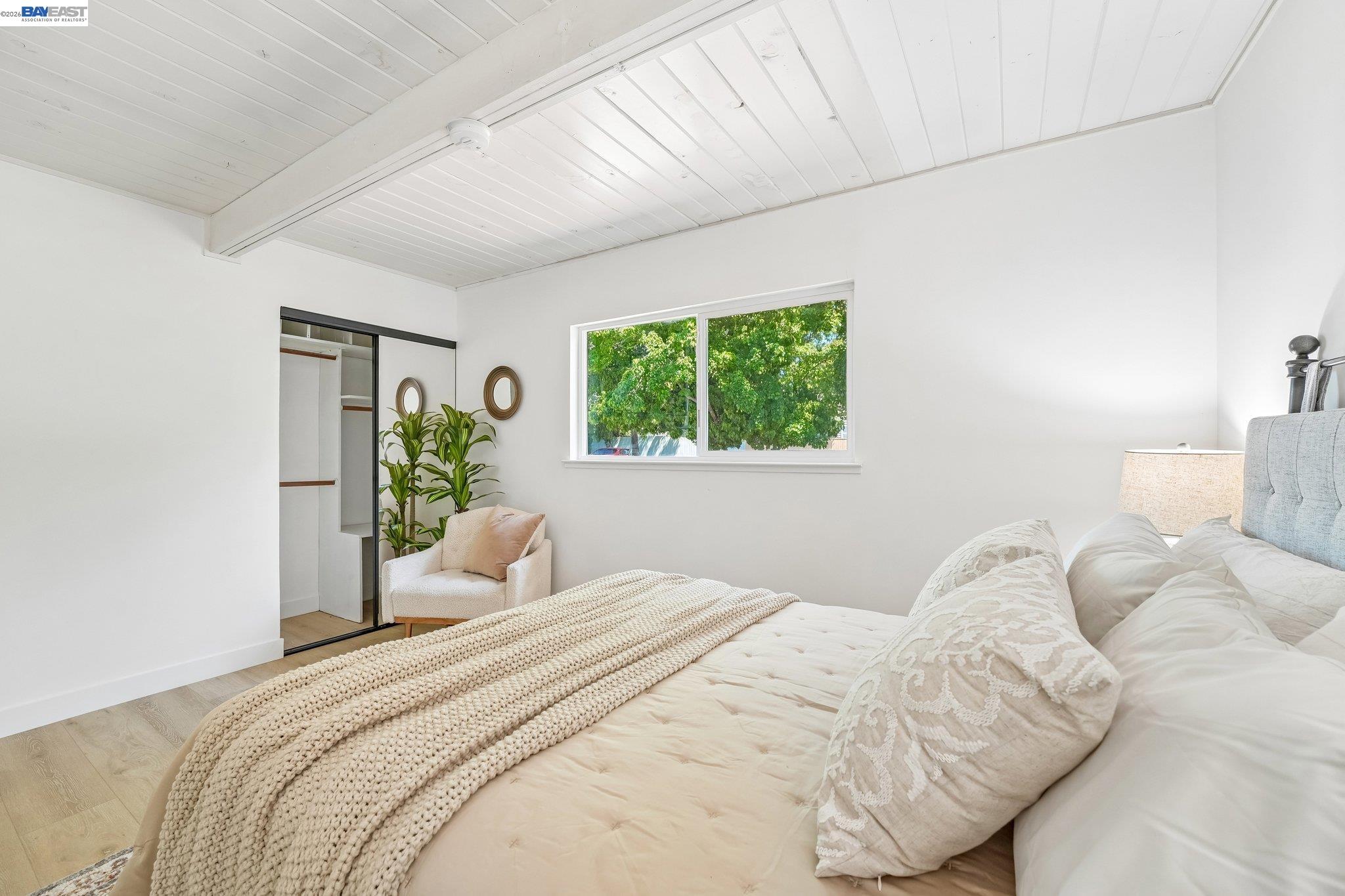 606 West 9th Street Santa Rosa, CA 95401 - Photo 41 of 52 a bedroom with a bed and a window