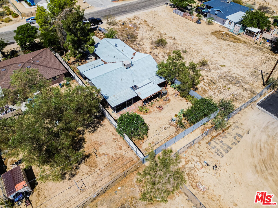 62033 Bonair Road Joshua Tree, CA 92252 - Photo 48 of 53 an aerial view of a house with a yard