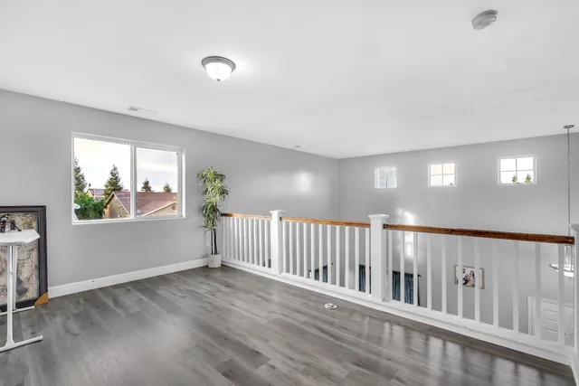 a view of entryway with wooden floor