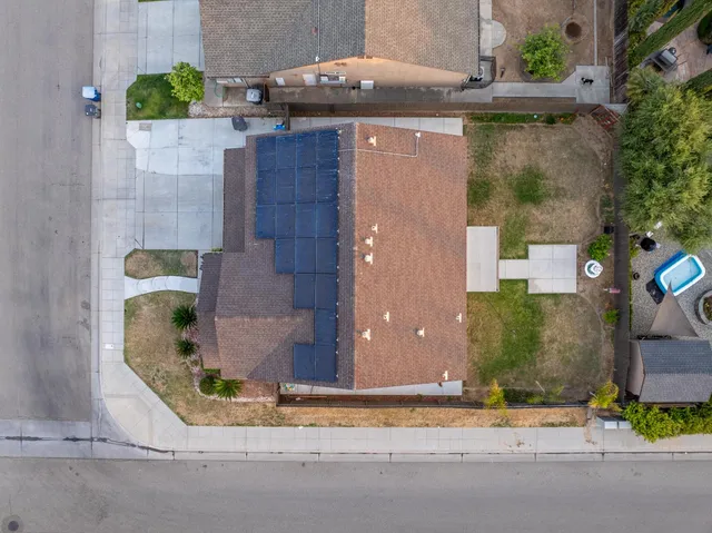 front view of a house with a street