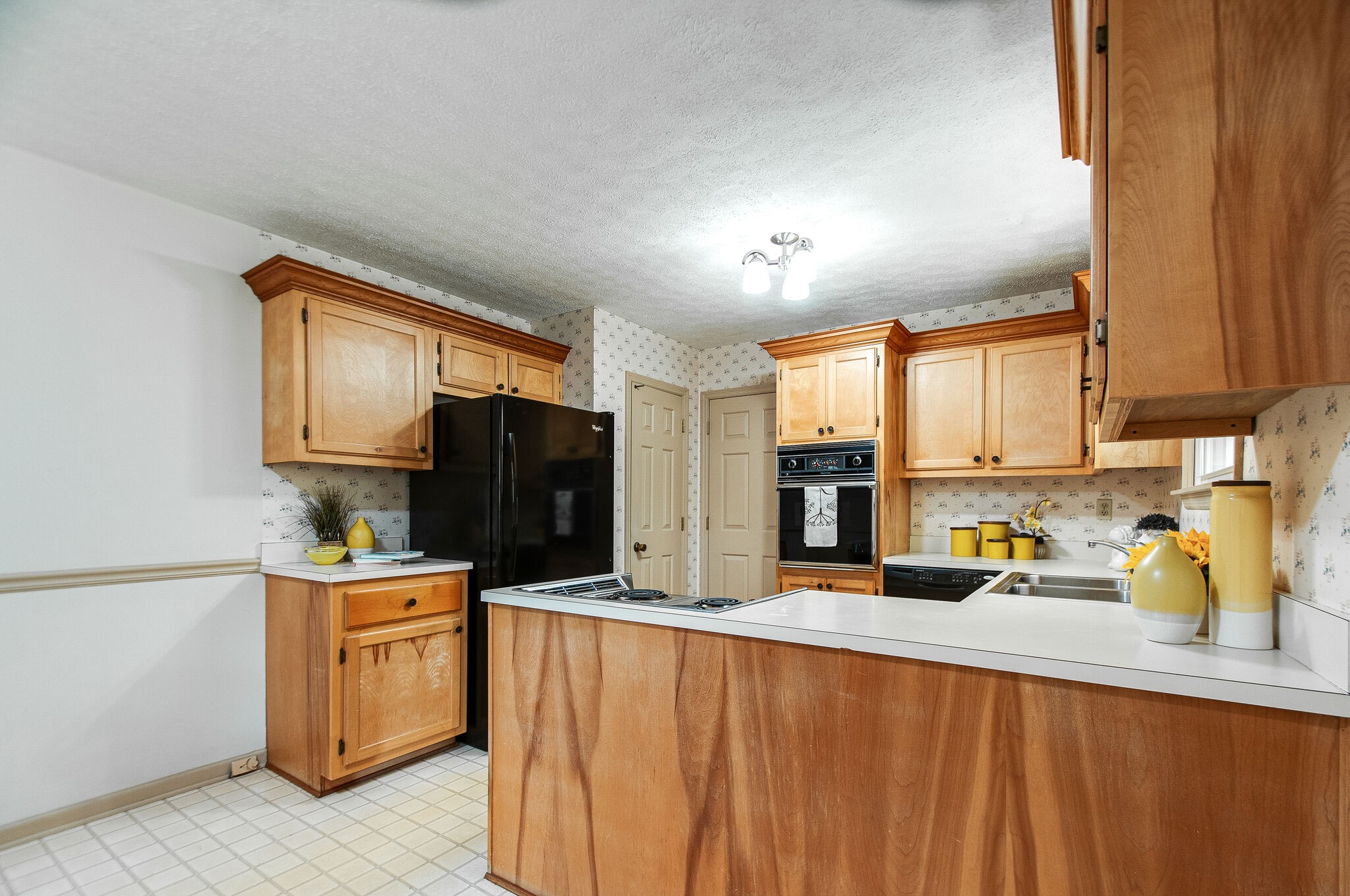 226 Old Columbia Road Dickson, TN 37055 - Photo 14 of 33 a kitchen with stainless steel appliances granite countertop a sink stove and cabinets