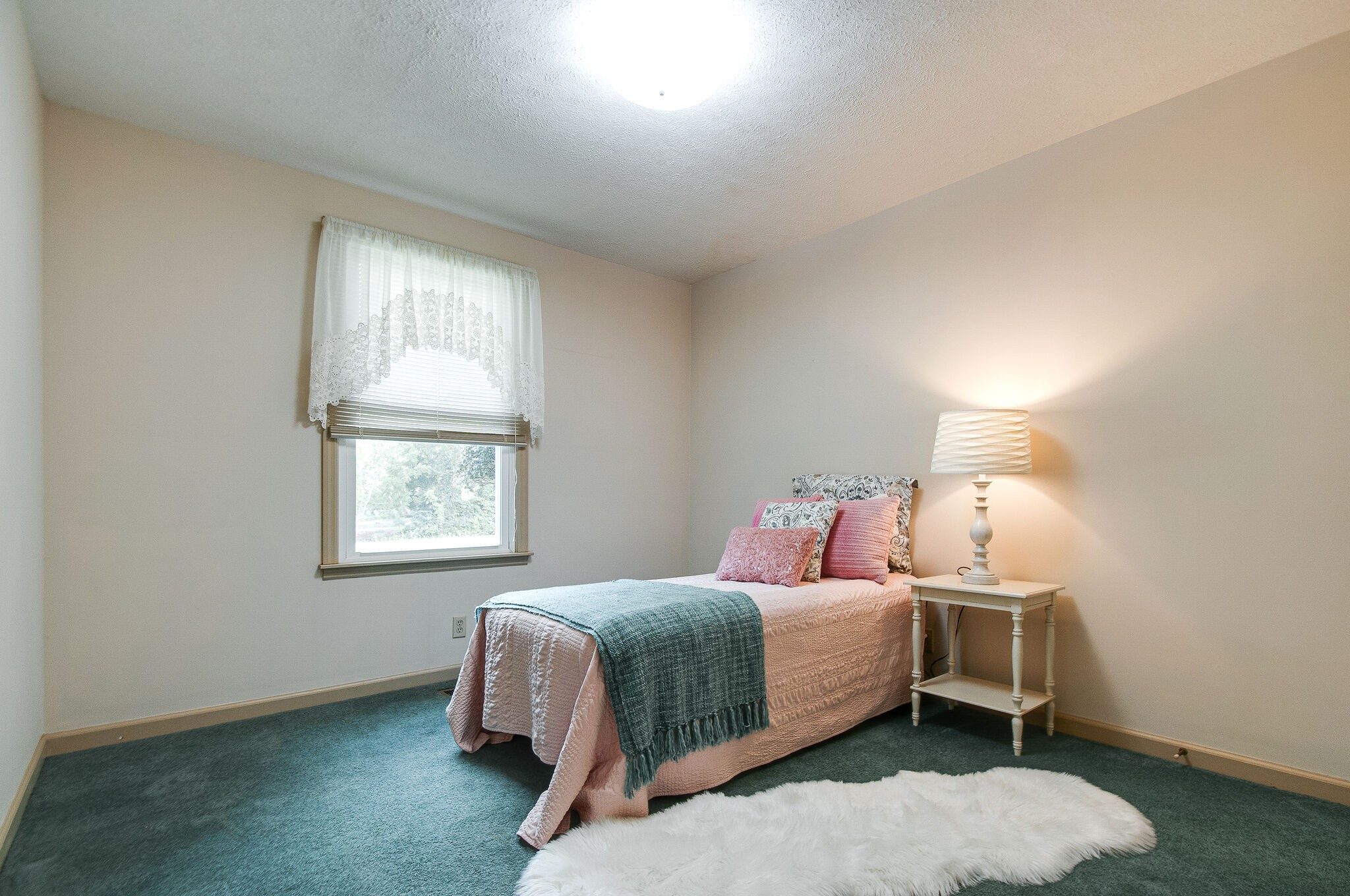 226 Old Columbia Road Dickson, TN 37055 - Photo 24 of 33 a bedroom with a bed and a window