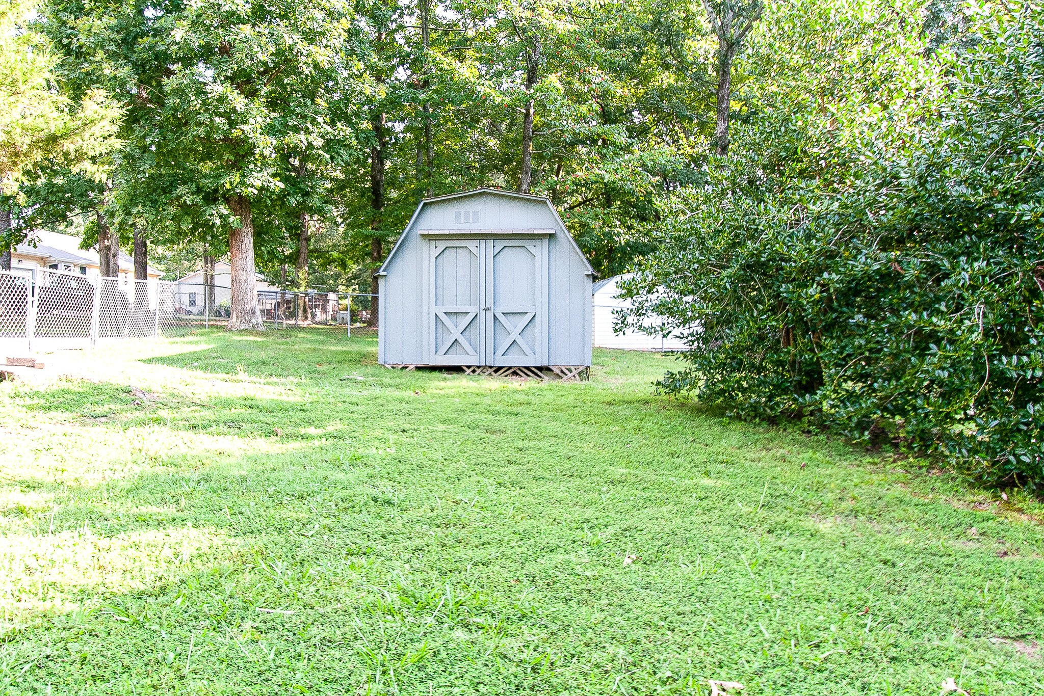 226 Old Columbia Road Dickson, TN 37055 - Photo 31 of 33 a wooden house with tall trees in the background