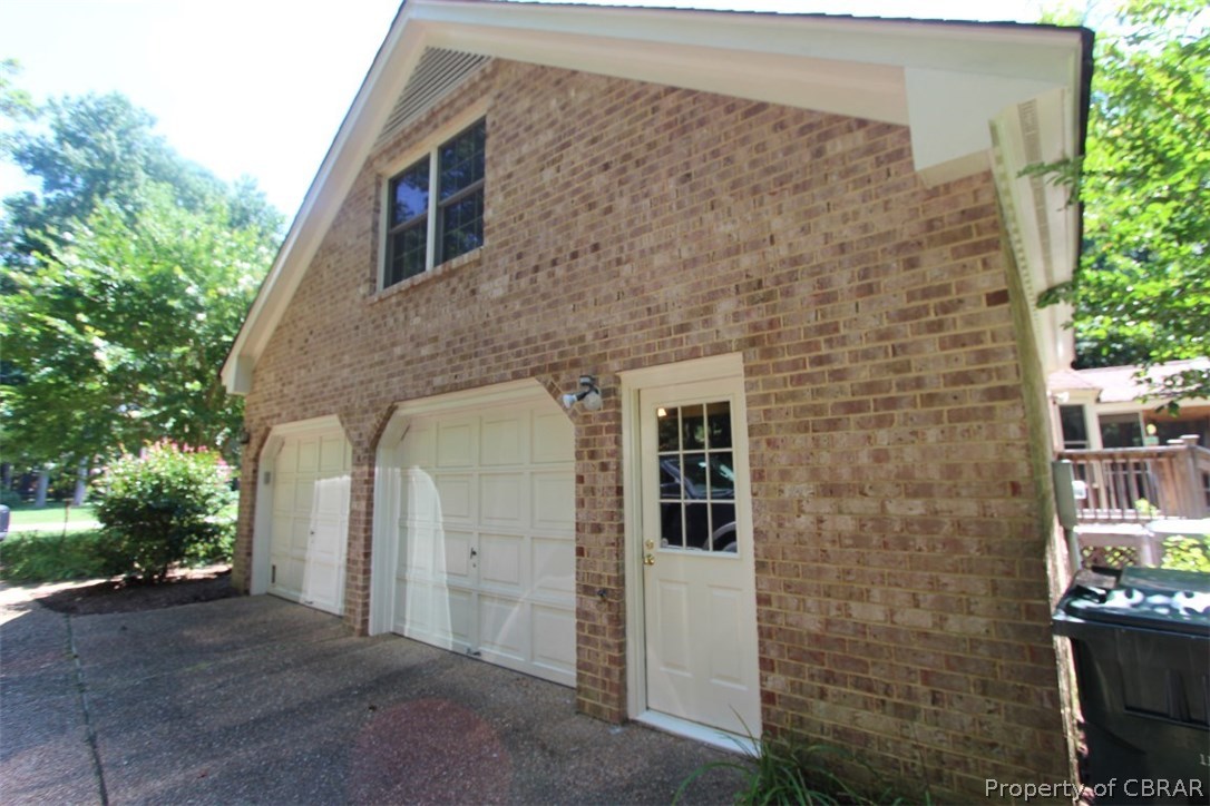 308 Tides Run Yorktown, VA 23692 - Photo 27 of 34 a front view of a house with a yard