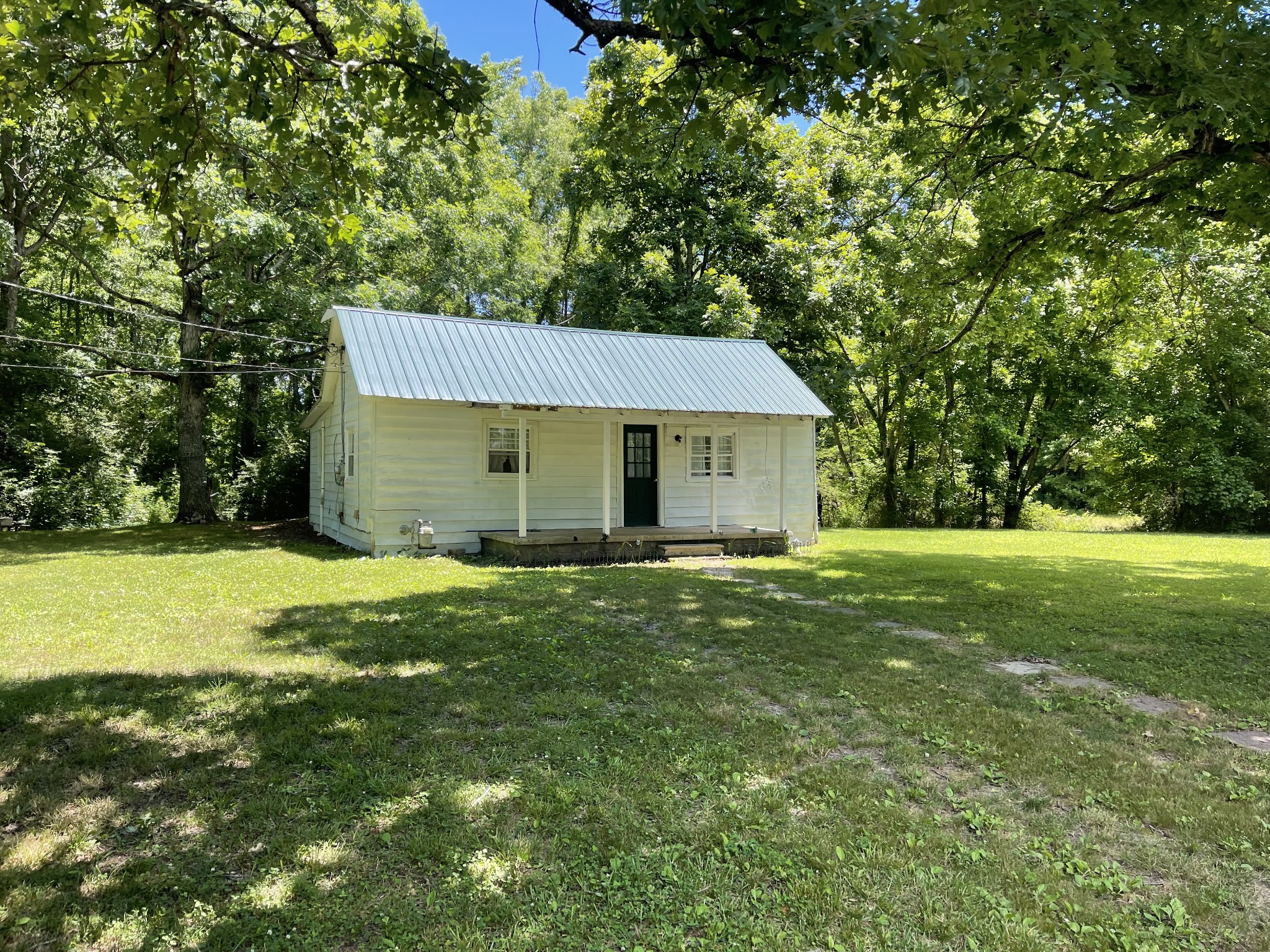 630 Pruett Road Dickson, TN 37055 - Photo 2 of 24 a view of a house with a backyard