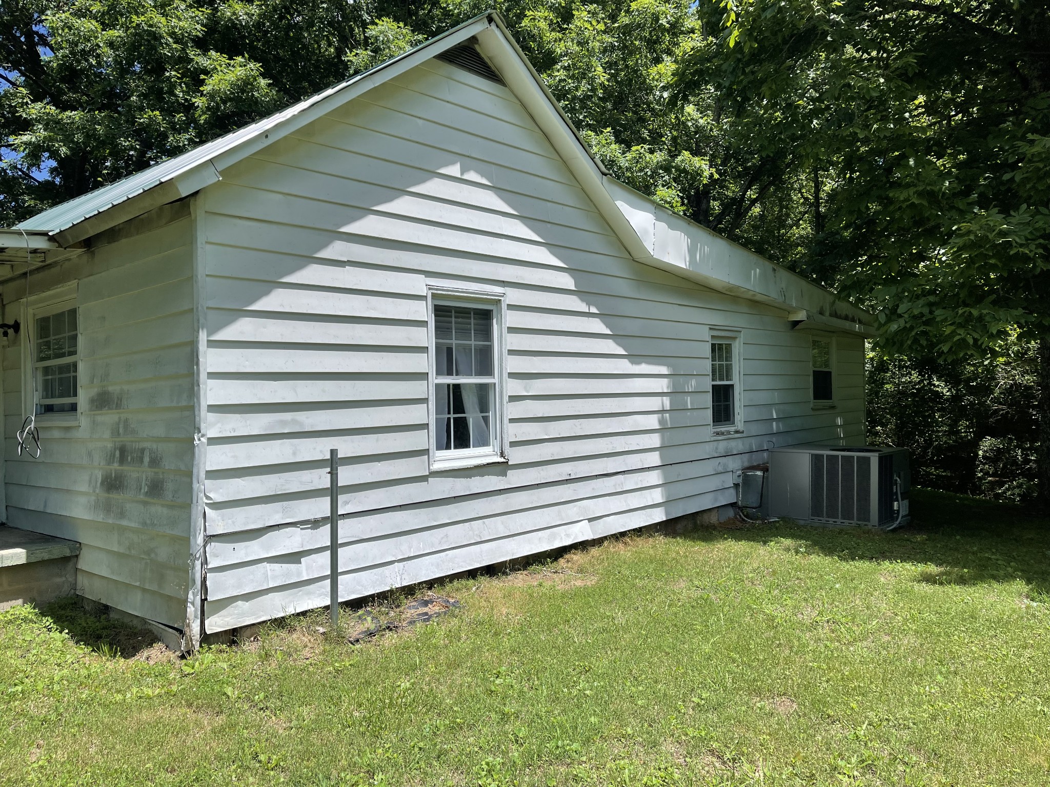630 Pruett Road Dickson, TN 37055 - Photo 21 of 24 a view of a house with a backyard