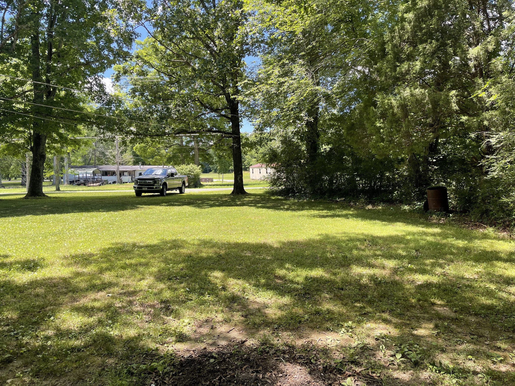 630 Pruett Road Dickson, TN 37055 - Photo 23 of 24 a view of yard with swimming pool and trees